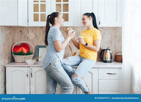 Same Sex Couple Having Breakfast In The Kitchen Stock Image Image Of