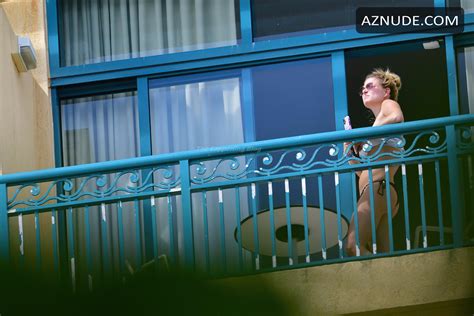 zara holland sexy enjoying vacation on her balcony in barbados aznude