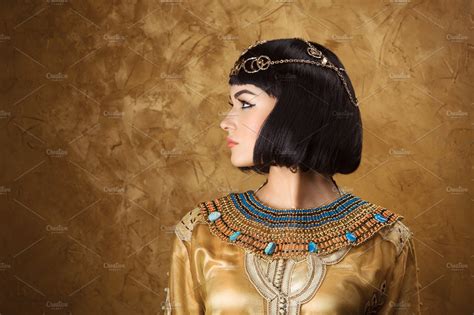 Beautiful Woman Like Egyptian Queen Cleopatra On Golden