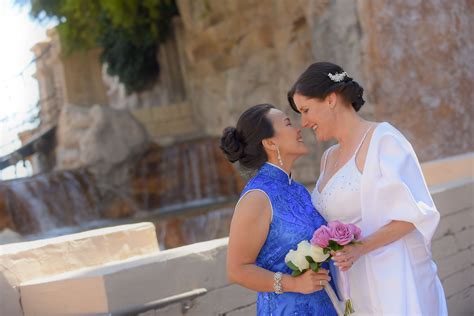 Two Brides At Their Las Vegas Wedding Lgbtq Wedding Inspiration Las