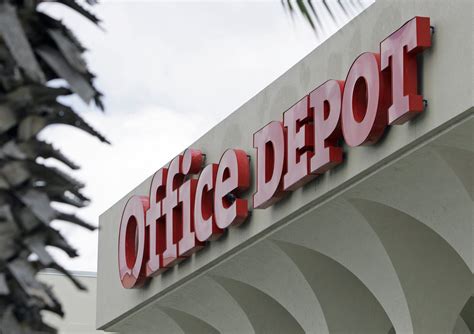 office depot  close  stores  acquiring rival officemax la times