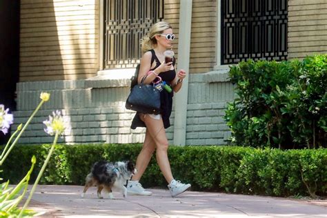 holly madison in short cutoffs and black tank top in la