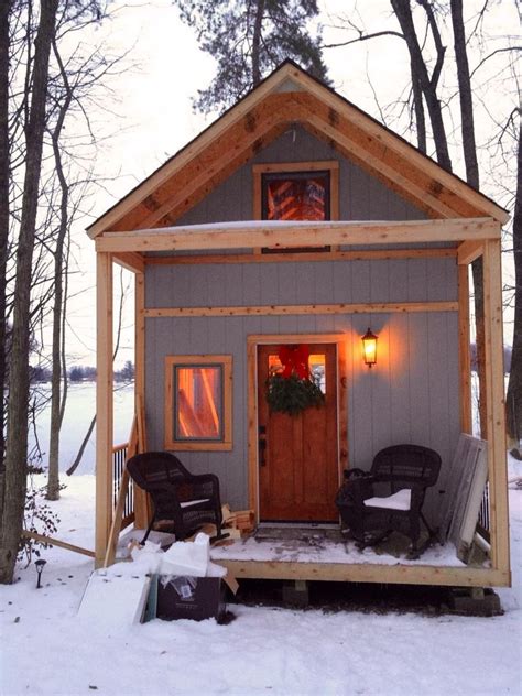 single mom builds  grid lakeside cabin  columbus ohio tiny house design