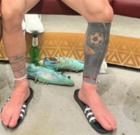 lionel messi  wearing  red ribbon   ankle