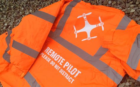 faa recommendation drone pilots  wear reflective orange vests