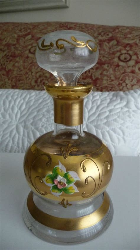 perfume bottles    colors sizes designs   displayed prominately perfume