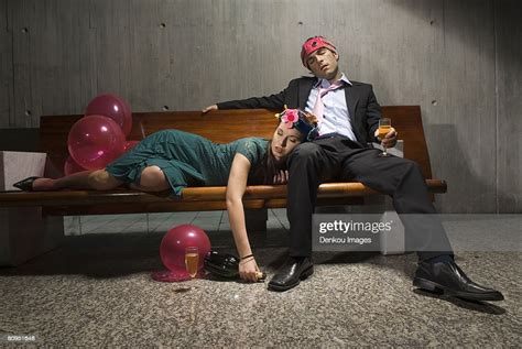 Exhausted Drunk Couple Passed Out From Partying Photo Getty Images