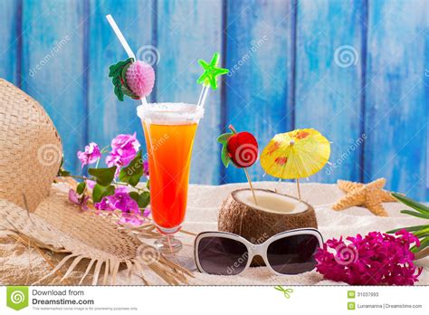 tropical cocktails on blue wood and sand sex on the beach stock image image of cocktail