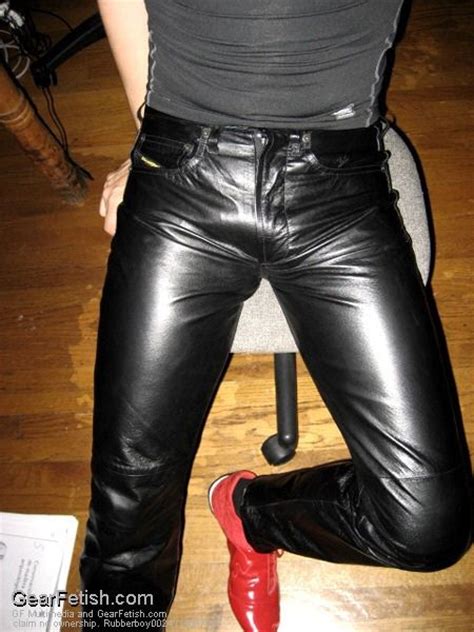 great pair of tight shiny jeans on a terrific pair of legs but wait what s this red
