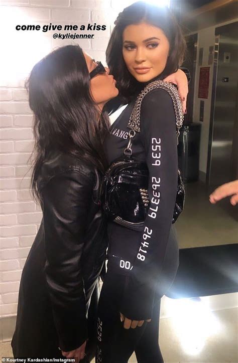 Kourtney Kardashian Lays A Smooch On Wax Figure Of Sister Kylie Jenner