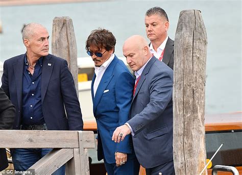 Johnny Depp Cuts A Suave Figure In Electric Blue Suit At The Venice