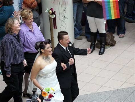 gay and lesbian couples celebrate at mass wedding at
