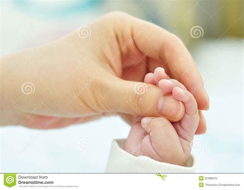 Small Hand In The Big Hand Royalty Free Stock Image