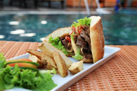 sandwich food  swimming pool outdoor stock photo image  potato gourmet