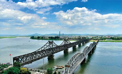 the bridge on the right across the yalu river in dandong