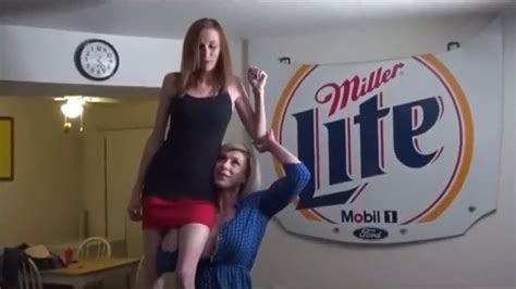 Tall Woman Easily Lifts Her Short Friend Youtube