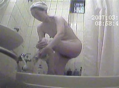 chubby amateur asian lady in the shower room caught on hidden cam