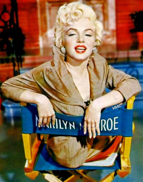 Marilyn Monroe Sitting In A Chair On The Set Of Her Show