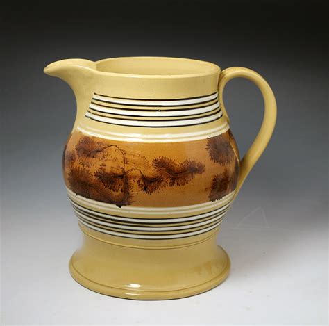 antique pottery yellow ware mocha decorated english pitcher