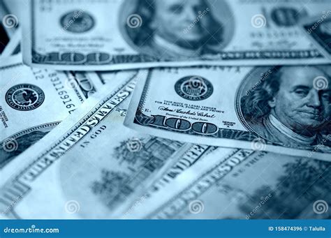 dollar bills blue color toned money background stock photo