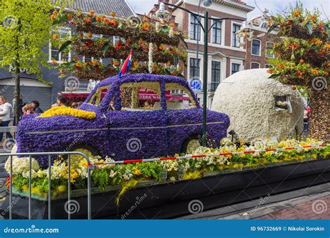 haarlem netherlands april   statue   tulips   editorial stock image image