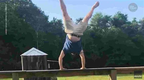 dad does impressive gymnastics routine on fence