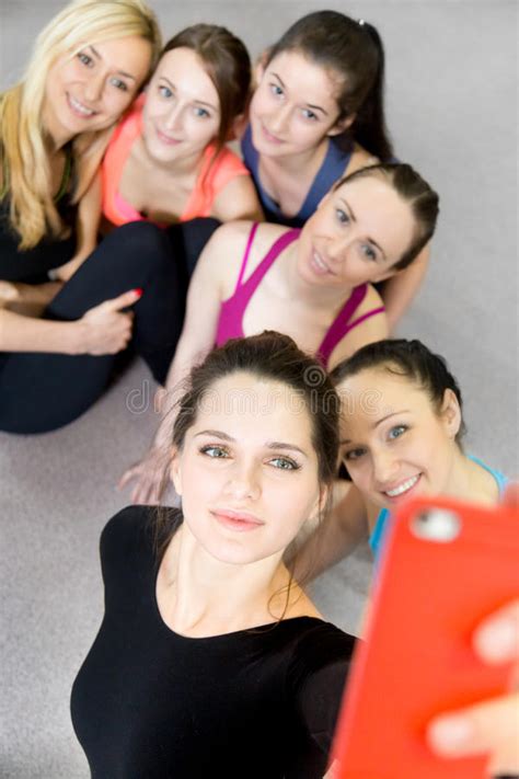 Group Of Beautiful Sporty Girlfriends Taking Selfie Self Portrait With