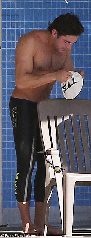 Lifeguard On Duty Zac Efron Showcases His Glistening Chiseled Chest