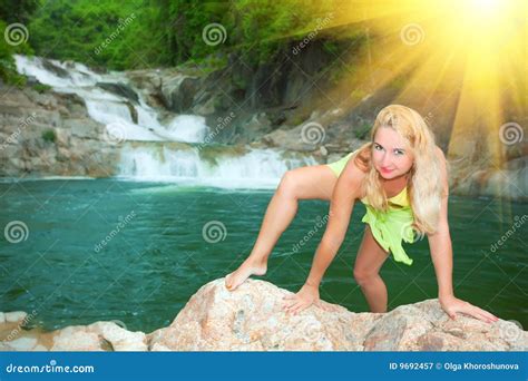 young woman  waterfall royalty  stock photography image