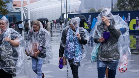 australians face dust clouds hail storms and flooding