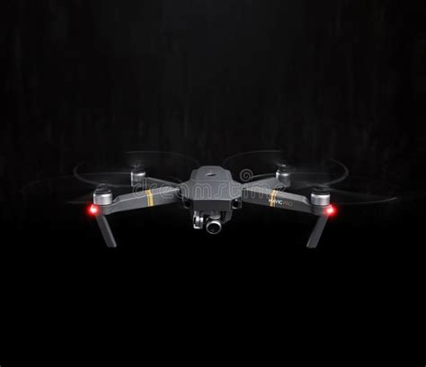 dji mavic pro drone flying   dark   black background editorial stock image image