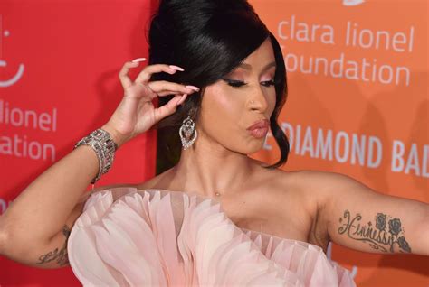 The Meaning Behind Cardi Bs 10 Tattoos Popsugar Beauty
