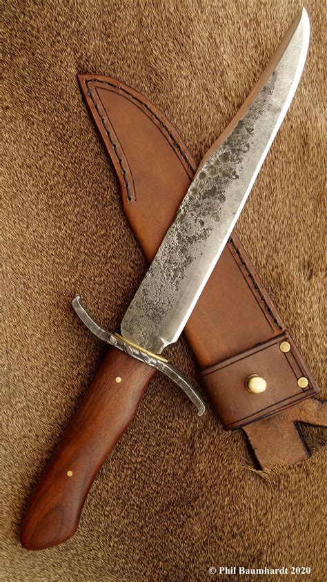 guard torreon bowie knife  walnut handle  leather sheath hand