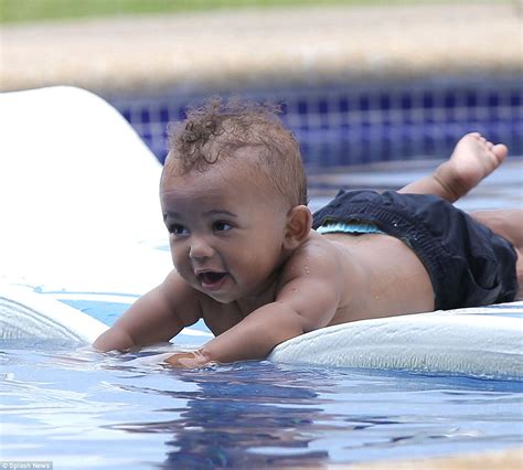 kim kardashian has some pooltime fun with north and saint daily mail