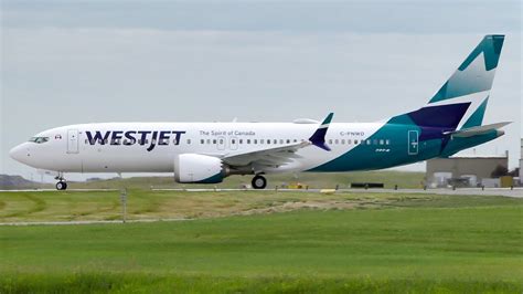 revenue flight westjet  livery boeing  max  takeoff