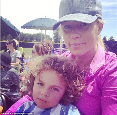 kendra wilkinson steps out wearing maternity support belt