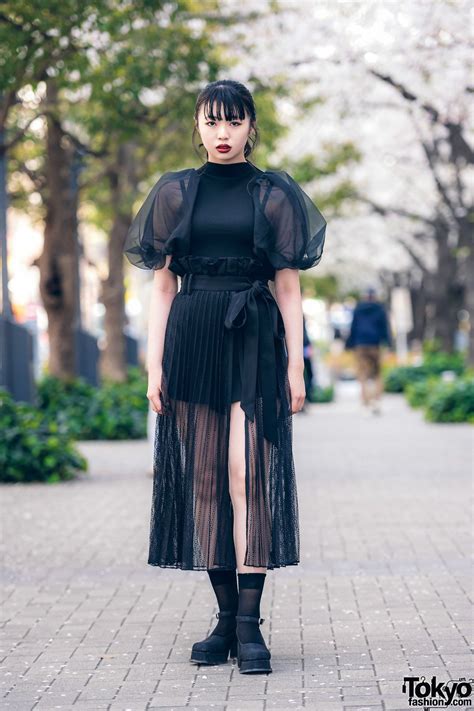 japanese model in chic all black streetwear style w