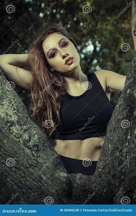Romantic Beautiful Woman In A Forest Redhead With Long Hair Stock