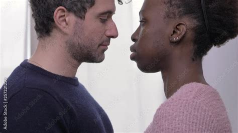 Young White Man And Black African Woman Kissing Mixed Interracial Love