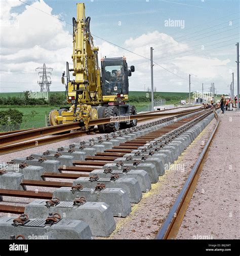 contractor  road rail machine  lift long lengths  welded rail  permanent sleepers