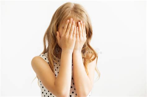 girl covering  face   hands stock photo image  hide concept
