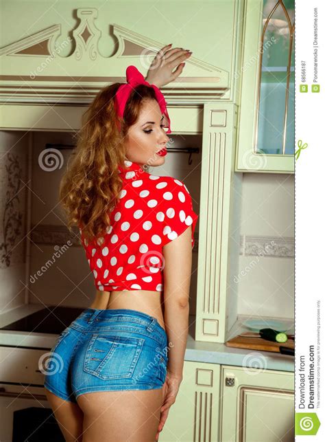 portrait of sexual woman in pinup style posing on kitchen stock image image of elegant