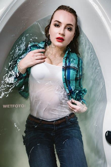 wetlook by seductive girl in soaking wet skinny jeans and pantyhose wetlook one