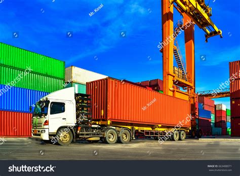 cargo container truck picking container yard stock photo