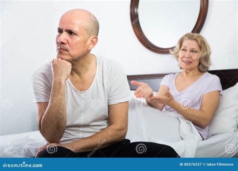 Mature Couple Having Quarrel In Bedroom Stock Image Image Of