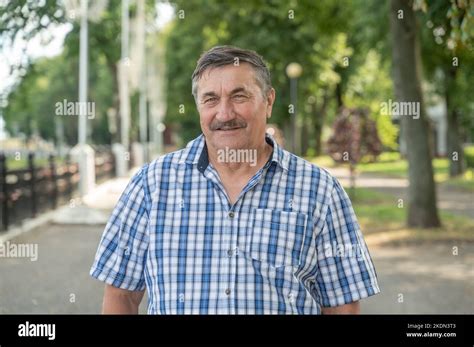portrait of a very old man 70 years old grandpa is resting in the