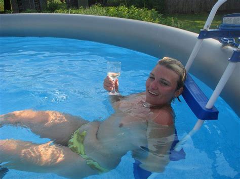 wife topless in the swimming pool motherless