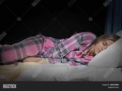 girl tied chain bed image and photo free trial bigstock