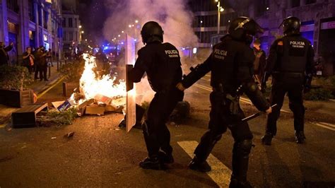 spanish police investigate role  foreigners  barcelona riots al arabiya english