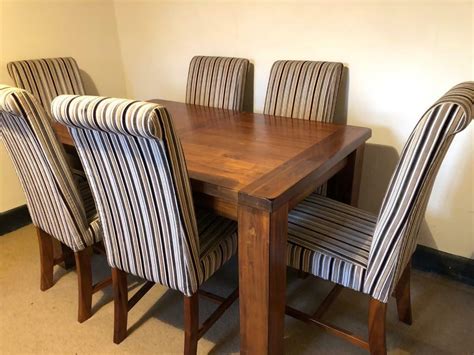 solid wood extendable dining table   chairs  farnham surrey
